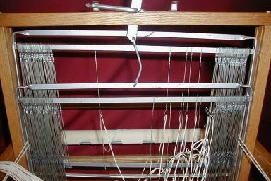 THREADING THE HEDDLES